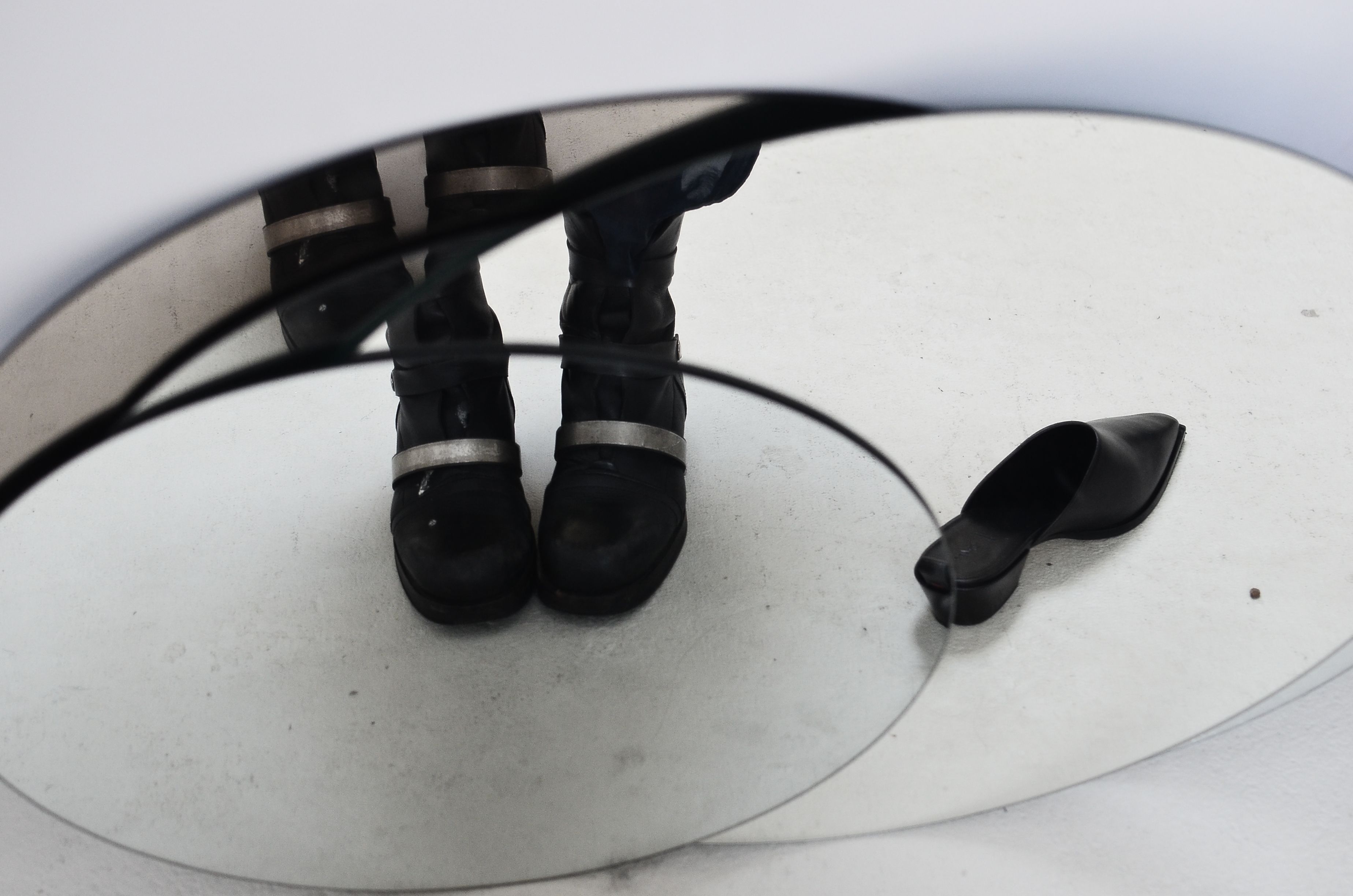 A mirrored sphere reflecting a distorted world back at itself
